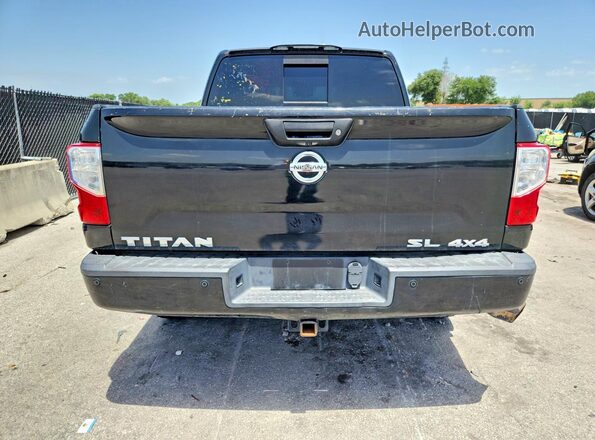 1N6AA1E55HN559258 2017 NISSAN TITAN Black Вид салону спереду