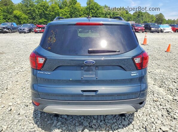 1FMCU9HD5KUA68671 2019 FORD ESCAPE Серый Вид салона спереди