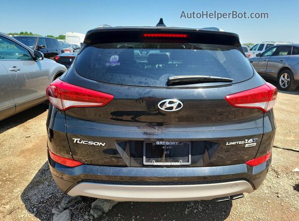 KM8J3CA26HU563776 2017 HYUNDAI TUCSON Black Вид салону спереду