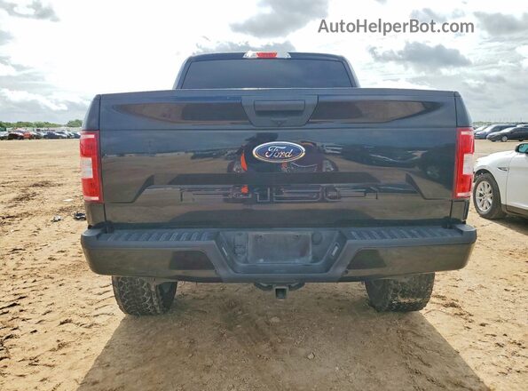 1FTEW1E52LKD43058 2020 FORD F150 Black Front interior view
