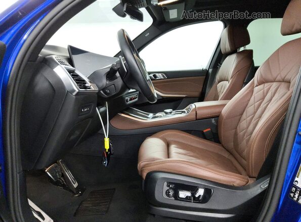 5UX33EU04T9018947 2026 BMW X5 Blue Dashboard view