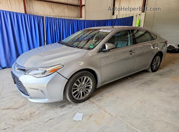 4T1BD1EB1GU056623 2016 TOYOTA AVALON Silver Trasero izquierdo