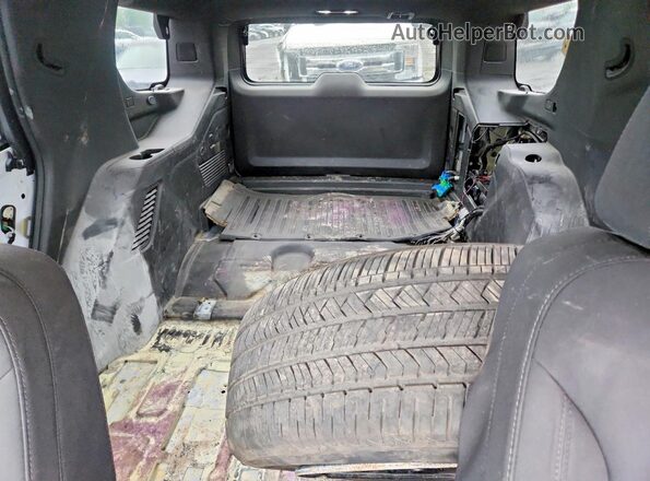 1GNSCLED6NR247787 2022 CHEVROLET TAHOE White Вид задньої частини салону