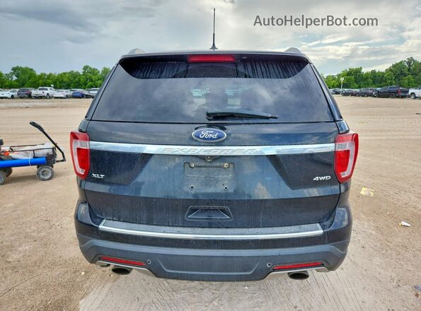 1FM5K8D87JGA61705 2018 FORD EXPLORER Black წინა სალონის ხედი