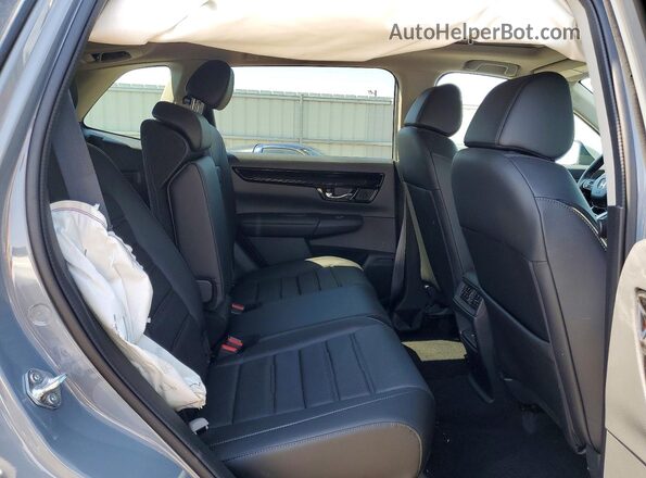 7FARS4H78SE018376 2025 HONDA CR-V Turquoise Rear interior view