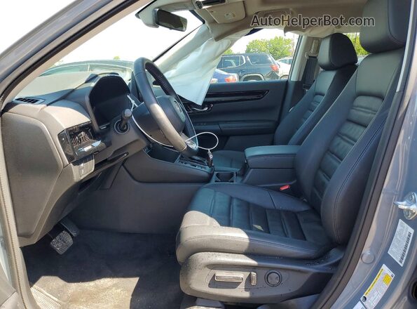 7FARS4H78SE018376 2025 HONDA CR-V Turquoise Front interior view