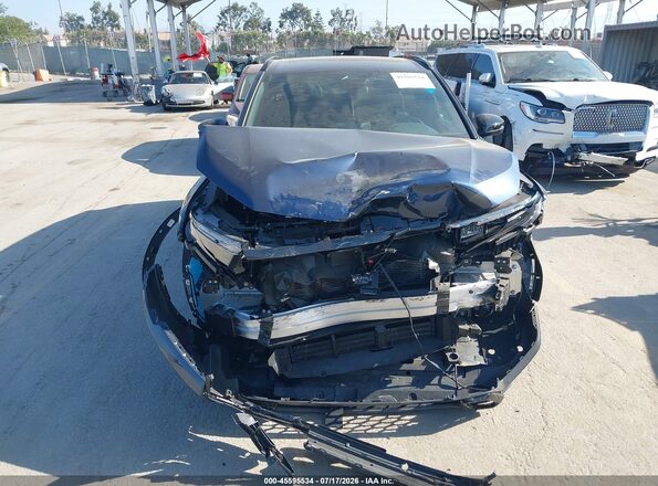7FARS6H57RE021631 2024 HONDA CR-V Dark Blue Вид задней части салона