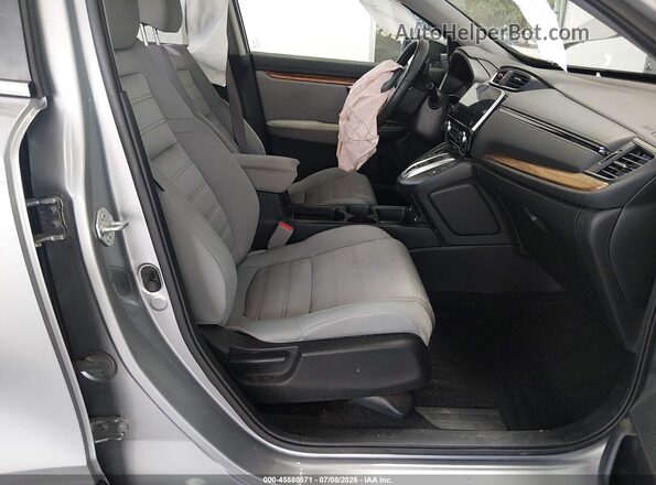 7FART6H56ME015406 2021 HONDA CR-V Silver Front interior view
