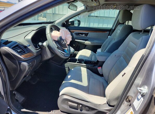 7FART6H5XME018860 2021 HONDA CR-V Silver Front interior view