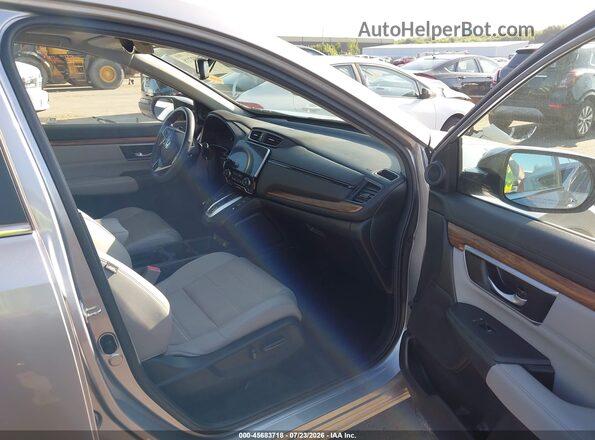 7FART6H85LE011842 2020 HONDA CR-V Silver Front interior view