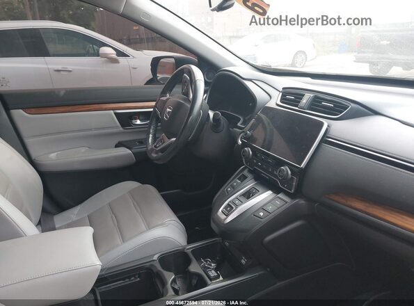 7FART6H89ME009500 2021 HONDA CR-V Blue Widok wnętrza z przodu