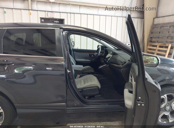 7FARW1H51JE010653 2018 HONDA CR-V Gray Front interior view