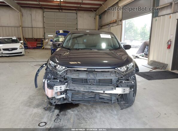 7FARW1H51JE010653 2018 HONDA CR-V Gray Rear interior view