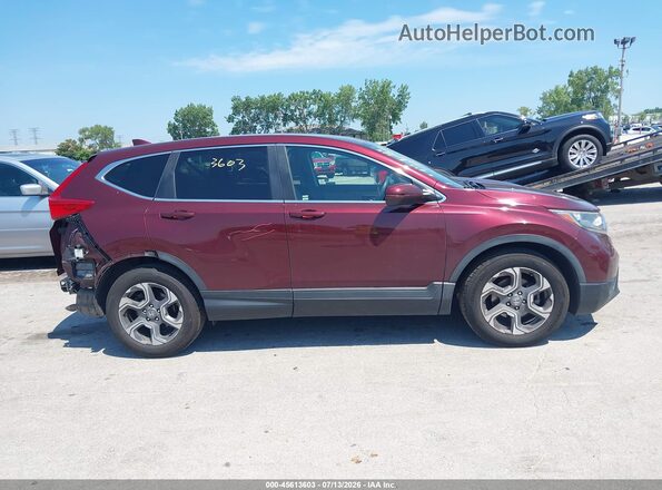 7FARW1H55KE024394 2019 HONDA CR-V Burgundy Widok wnętrza z tyłu