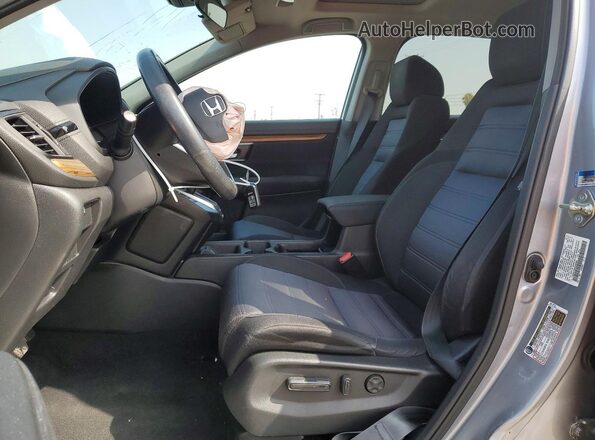 7FARW1H55KE035363 2019 HONDA CR-V Silver Front interior view