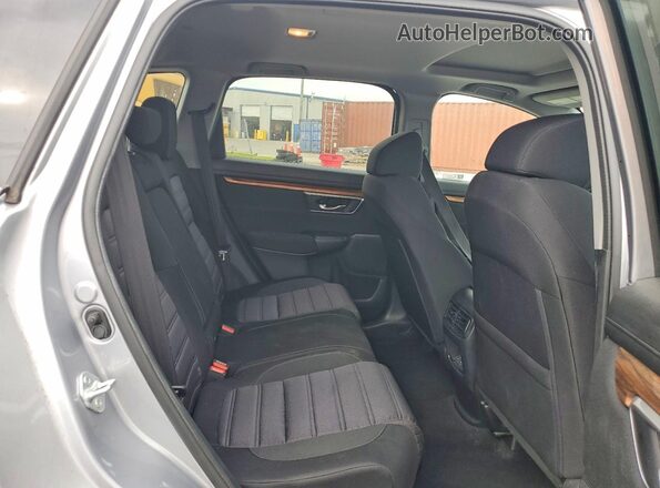 7FARW1H57LE029372 2020 HONDA CR-V Silver Rear interior view