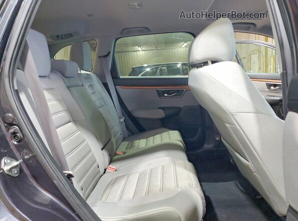 7FARW1H5XJE009694 2018 HONDA CR-V Charcoal Vista interior trasera