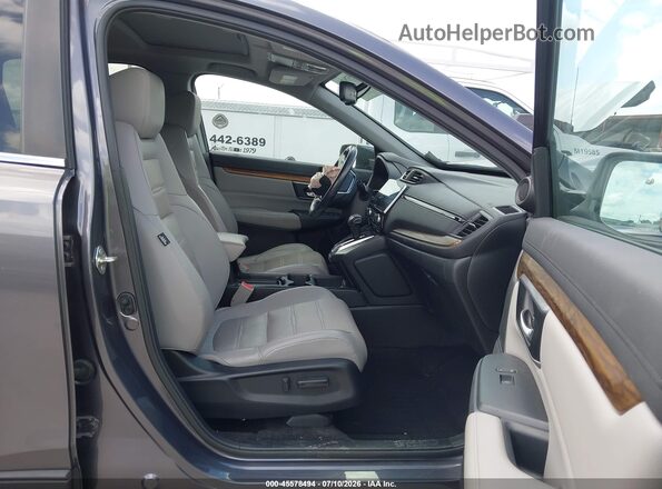 7FARW1H81HE005604 2017 HONDA CR-V Gray Widok wnętrza z przodu