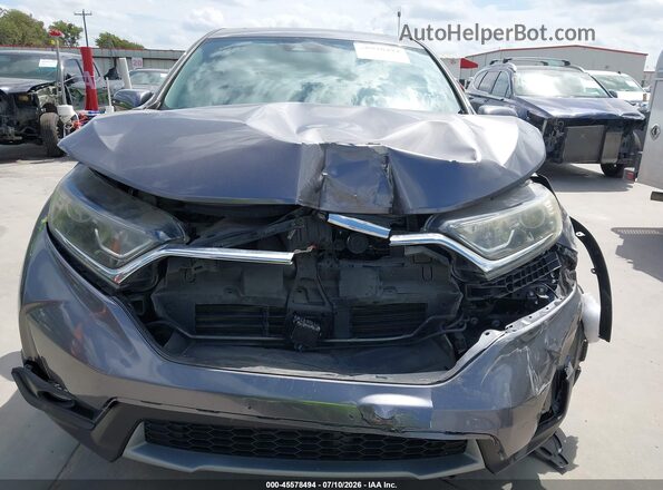 7FARW1H81HE005604 2017 HONDA CR-V Gray Widok wnętrza z tyłu