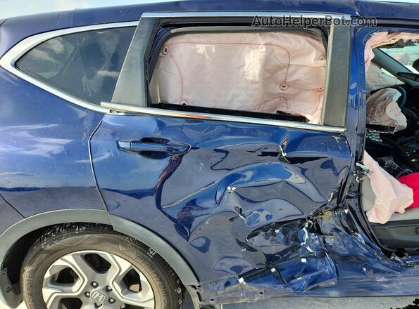 7FARW1H86HE036346 2017 HONDA CR-V Blue Widok wnętrza z tyłu