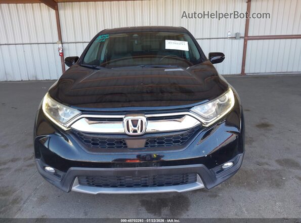 7FARW1H88HE000531 2017 HONDA CR-V Black Rear interior view