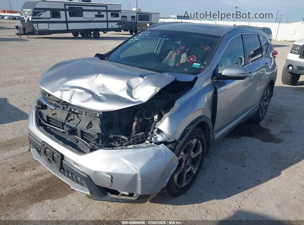 7FARW1H96KE009874 2019 HONDA CR-V Серебряный Передняя левая четверть