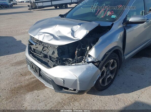 7FARW1H96KE009874 2019 HONDA CR-V Серебряный Вид спереди