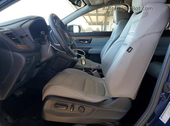 7FARW1H98JE026061 2018 HONDA CR-V Blue Front interior view