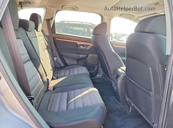 7FARW2H50KE047314 2019 HONDA CR-V Silver Rear interior view