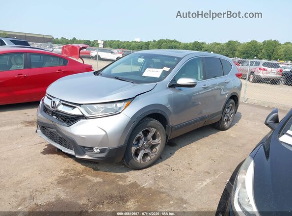 7FARW2H56KE019646 2019 HONDA CR-V Silver Vista tres cuartos delantera izquierda