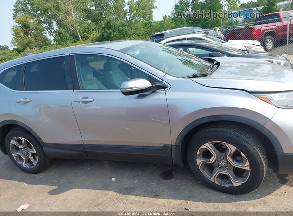 7FARW2H56KE019646 2019 HONDA CR-V Silver Vista interior trasera