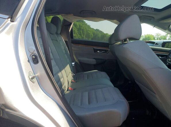 7FARW2H58KE029899 2019 HONDA CR-V Серебряный Вид задней части салона