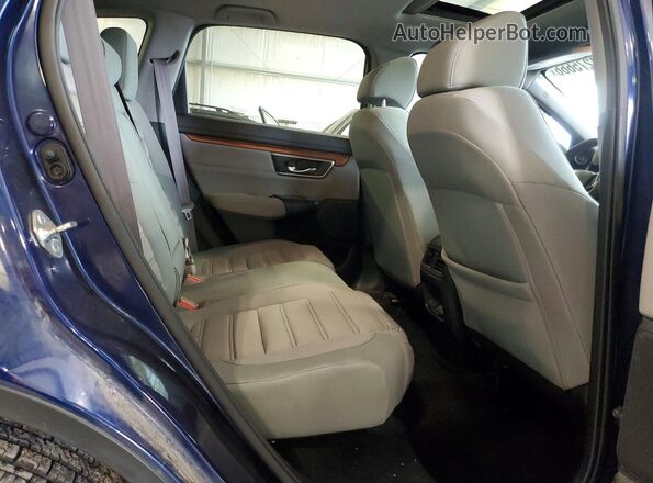 7FARW2H59KE013677 2019 HONDA CR-V Blue Rear seats view