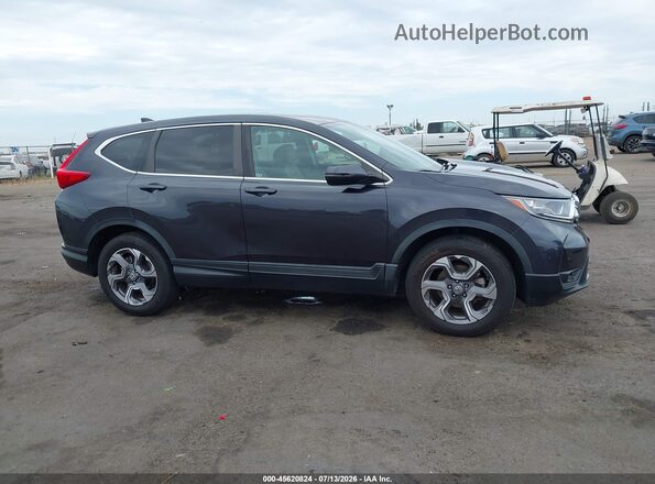 7FARW2H5XJE038926 2018 HONDA CR-V Gray Vista interior trasera