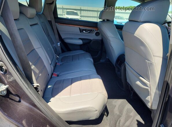 7FARW2H82JE000357 2018 HONDA CR-V Gray Rear interior view