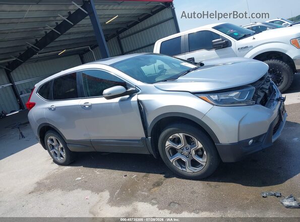 7FARW2H87JE053538 2018 HONDA CR-V Silver Widok wnętrza z tyłu