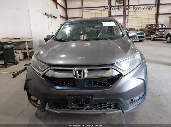 7FARW2H89JE048955 2018 HONDA CR-V Gray Widok wnętrza z tyłu