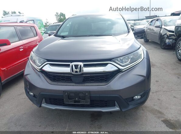 7FARW2H8XJE090258 2018 HONDA CR-V Серый Вид задней части салона