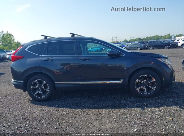 7FARW2H94JE025446 2018 HONDA CR-V Gray Vista interior trasera