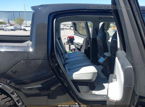 7FCTGAAAXPN020981 2023 RIVIAN R1T Black VIN კოდის სტიკერის ხედი