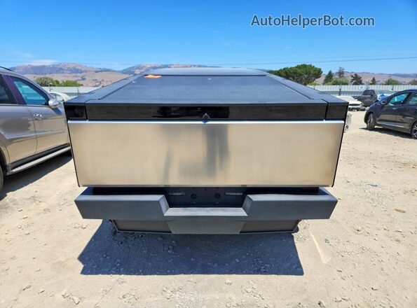7G2CEHED1RA022557 2024 TESLA CYBERTRUCK Silver Rear view