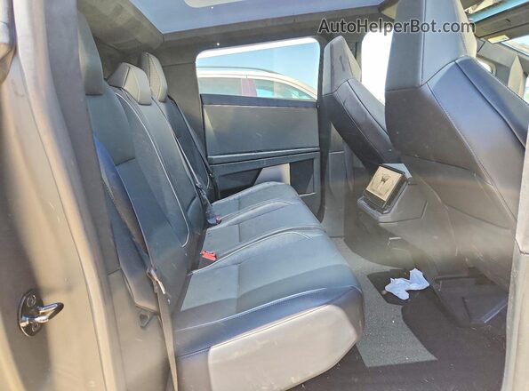 7G2CEHED1RA022557 2024 TESLA CYBERTRUCK Silver Rear interior view