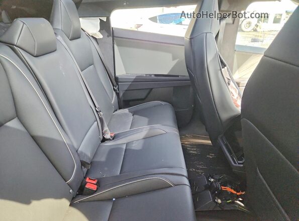 7G2CEHEE7RA046855 2024 TESLA CYBERTRUCK Black Rear seats view