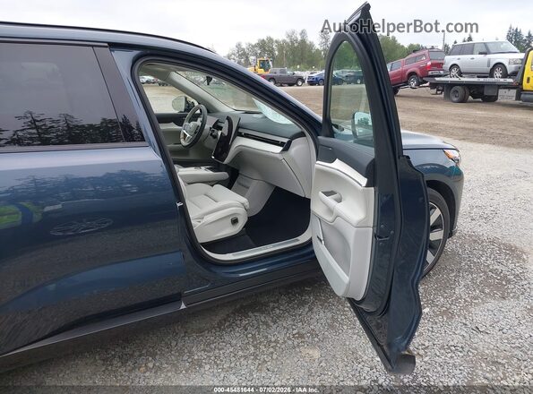 7JDEV3VL7SG016340 2025 VOLVO EX90 Blue წინა სალონის ხედი