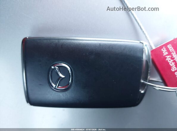 7MMVAADW3SN102714 2025 MAZDA CX-50 HYBRID Gray Vista del salpicadero