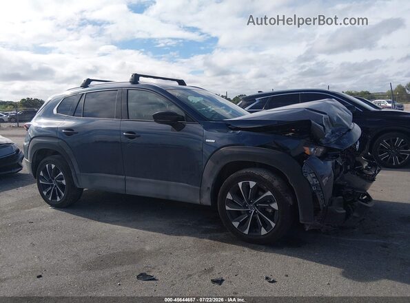 7MMVAAEW5SN136460 2025 MAZDA CX-50 HYBRID Blue Սալոնի հետևի տեսք