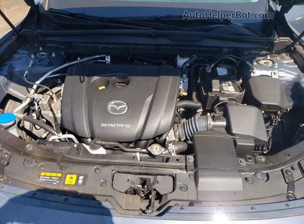 7MMVABBM9RN170131 2024 MAZDA CX-5 Blue Widok wnętrza z tyłu