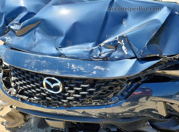 7MMVABCM1PN117743 2023 MAZDA CX-5 Blue Vista del compartimento del motor