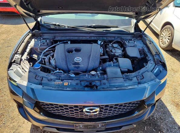 7MMVABDM1RN212370 2024 MAZDA CX-5 Gray Widok wnętrza z tyłu
