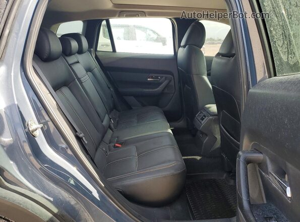 7MMVABEM8PN105618 2023 MAZDA CX-5 Gray Vista interior trasera